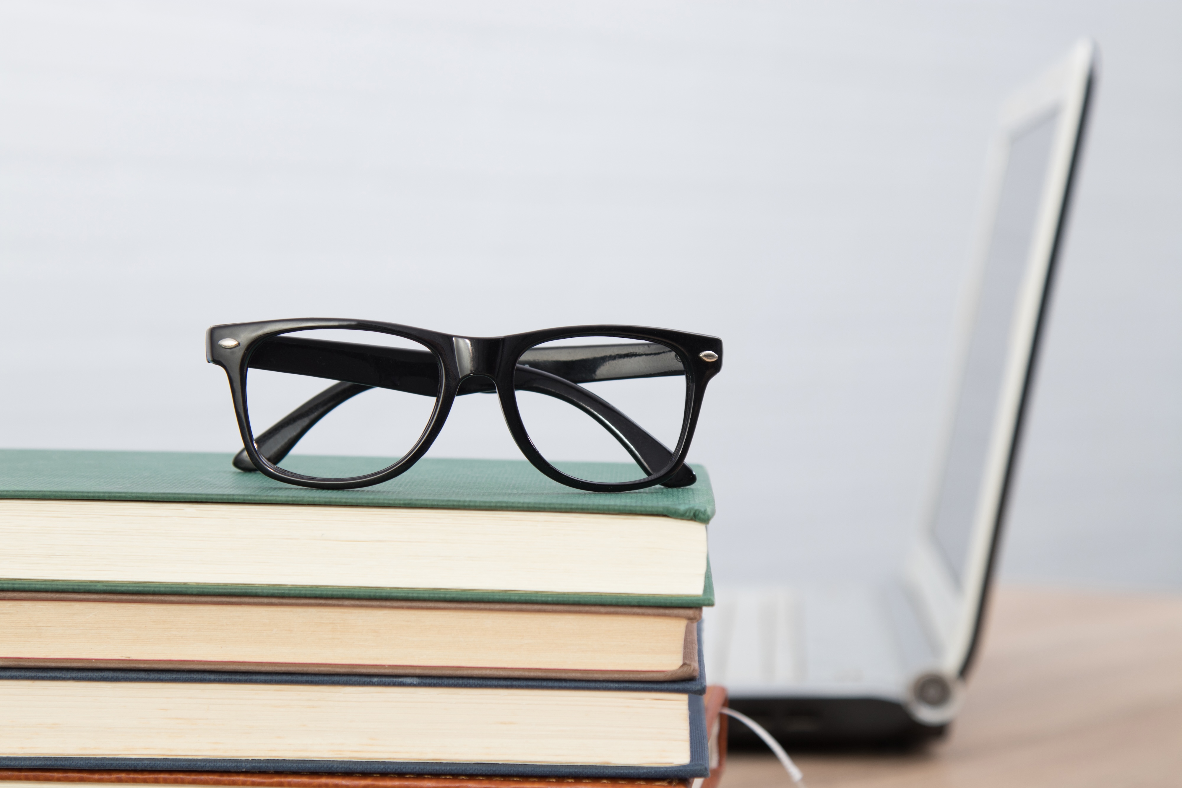 Glasses on books
